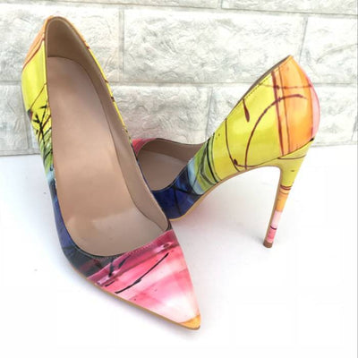 Bright yellow high heels with a pointed toe and high stiletto heel for a bold, stylish look.