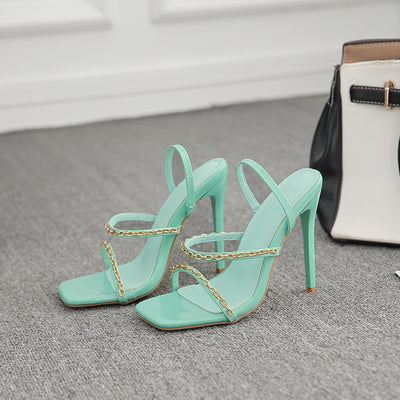 One-pedal slip-on high heels with metal accents, open side and back design, super high heel, European-American style, sizes 35–42.