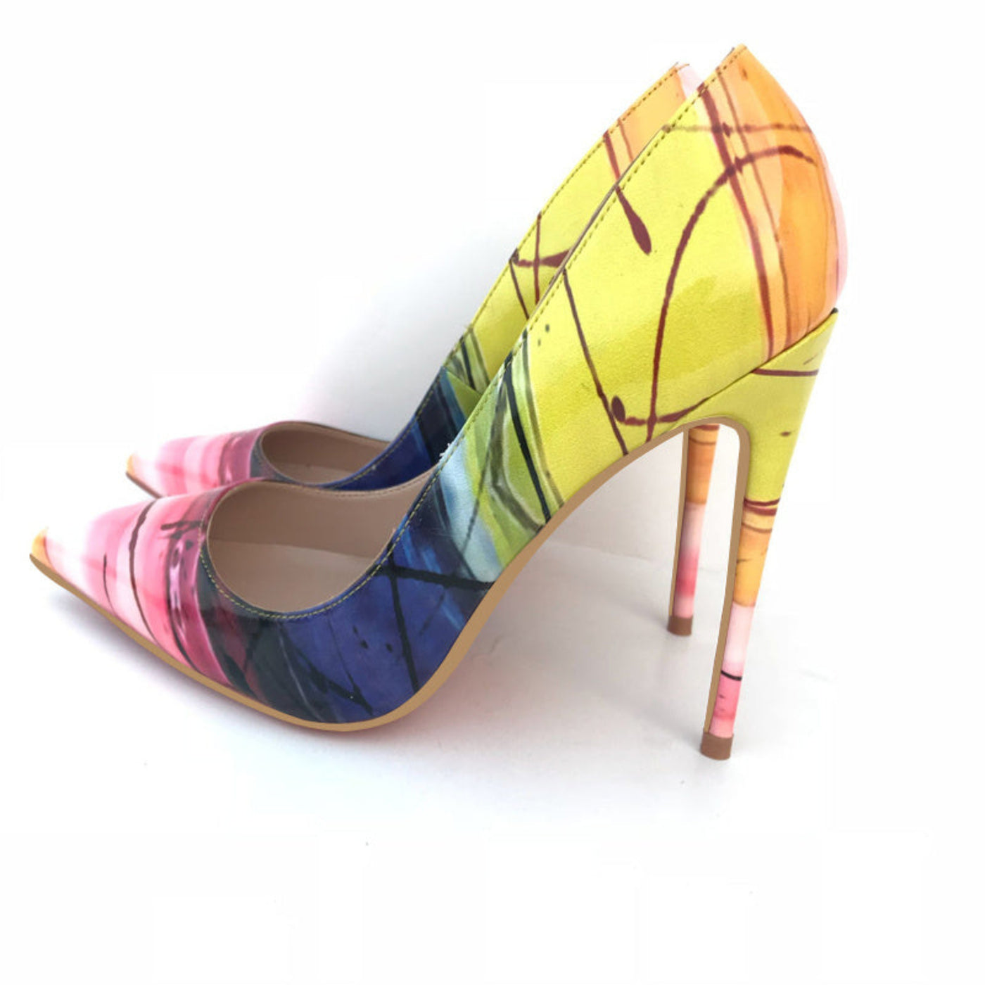Bright yellow high heels with a pointed toe and high stiletto heel for a bold, stylish look.