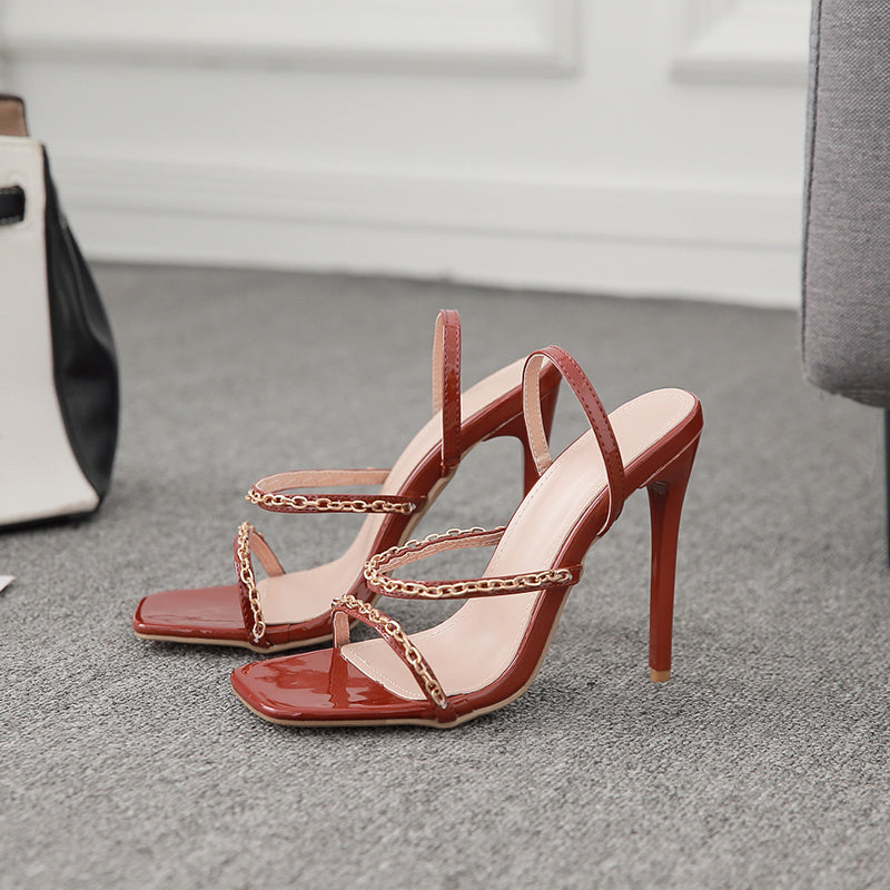 One-pedal slip-on high heels with metal accents, open side and back design, super high heel, European-American style, sizes 35–42.
