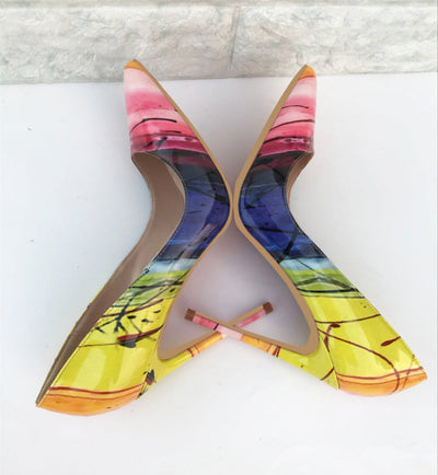 Bright yellow high heels with a pointed toe and high stiletto heel for a bold, stylish look.