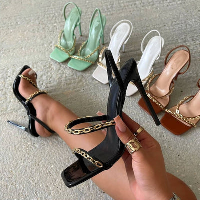 One-pedal slip-on high heels with metal accents, open side and back design, super high heel, European-American style, sizes 35–42.