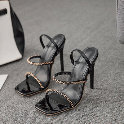 One-pedal slip-on high heels with metal accents, open side and back design, super high heel, European-American style, sizes 35–42.